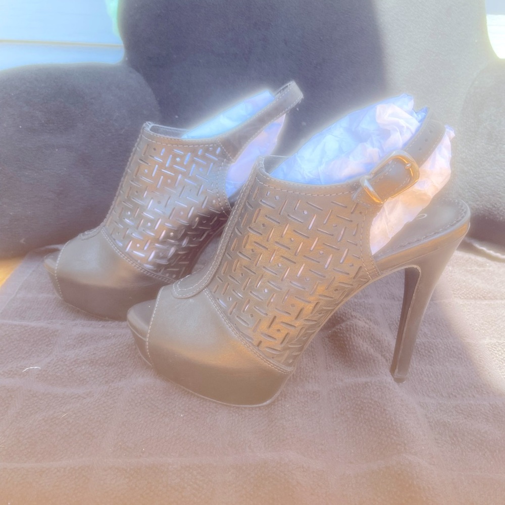 Carlo Rossetti sling back platform heels used